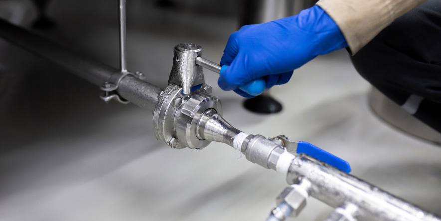 Food Machinery Maintenance Devon - Tightening Pipe - SPX Refrigeration